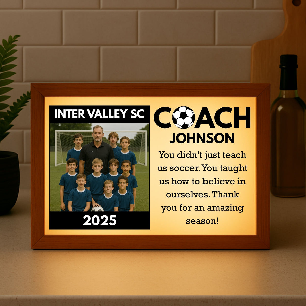 Custom soccer coach light box with team photo, coach name, year, and personalized message