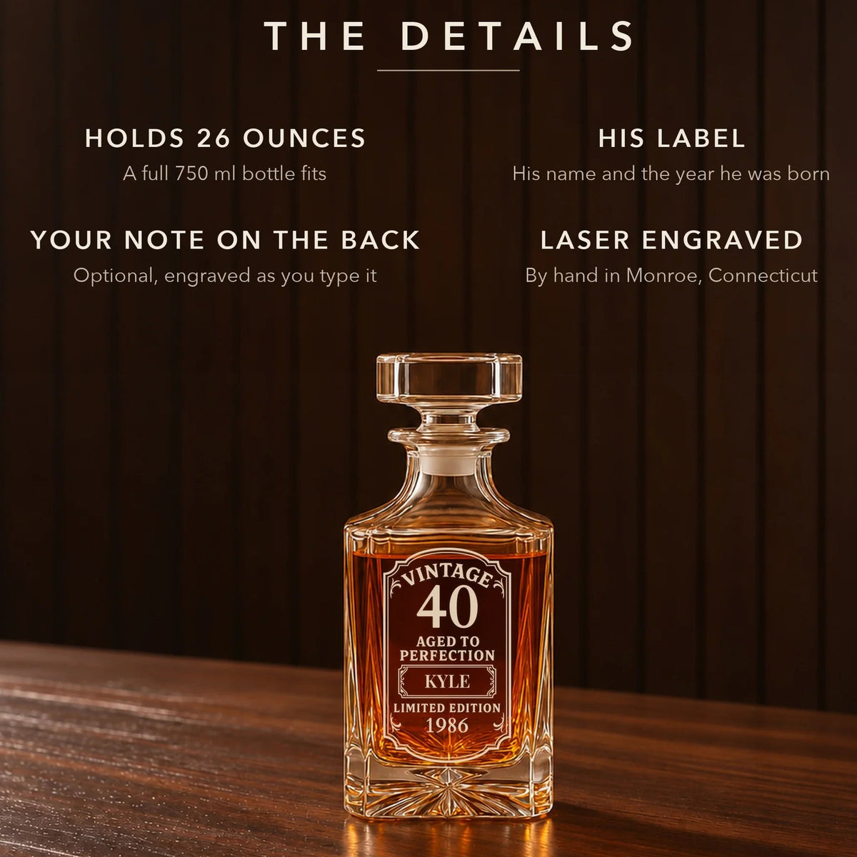 Crystal decanter with laser-engraved vintage label showing "40 Aged to Perfection Kyle Limited Edition 1986," 26-ounce capacity, wood table background.