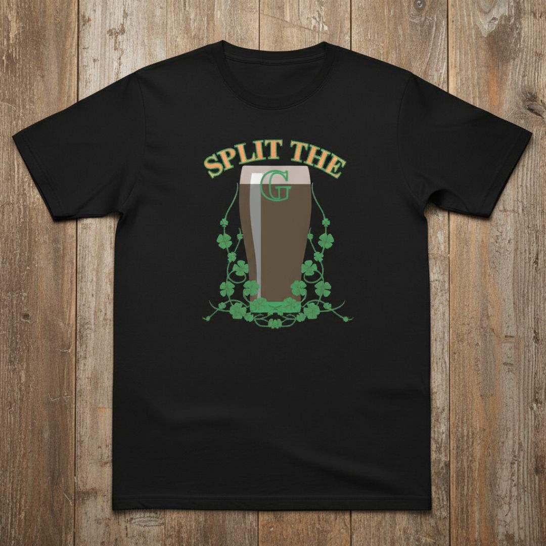 Black t-shirt with "Split the G" text in green above an illustration of a beer glass surrounded by decorative shamrock designs and a monogram G