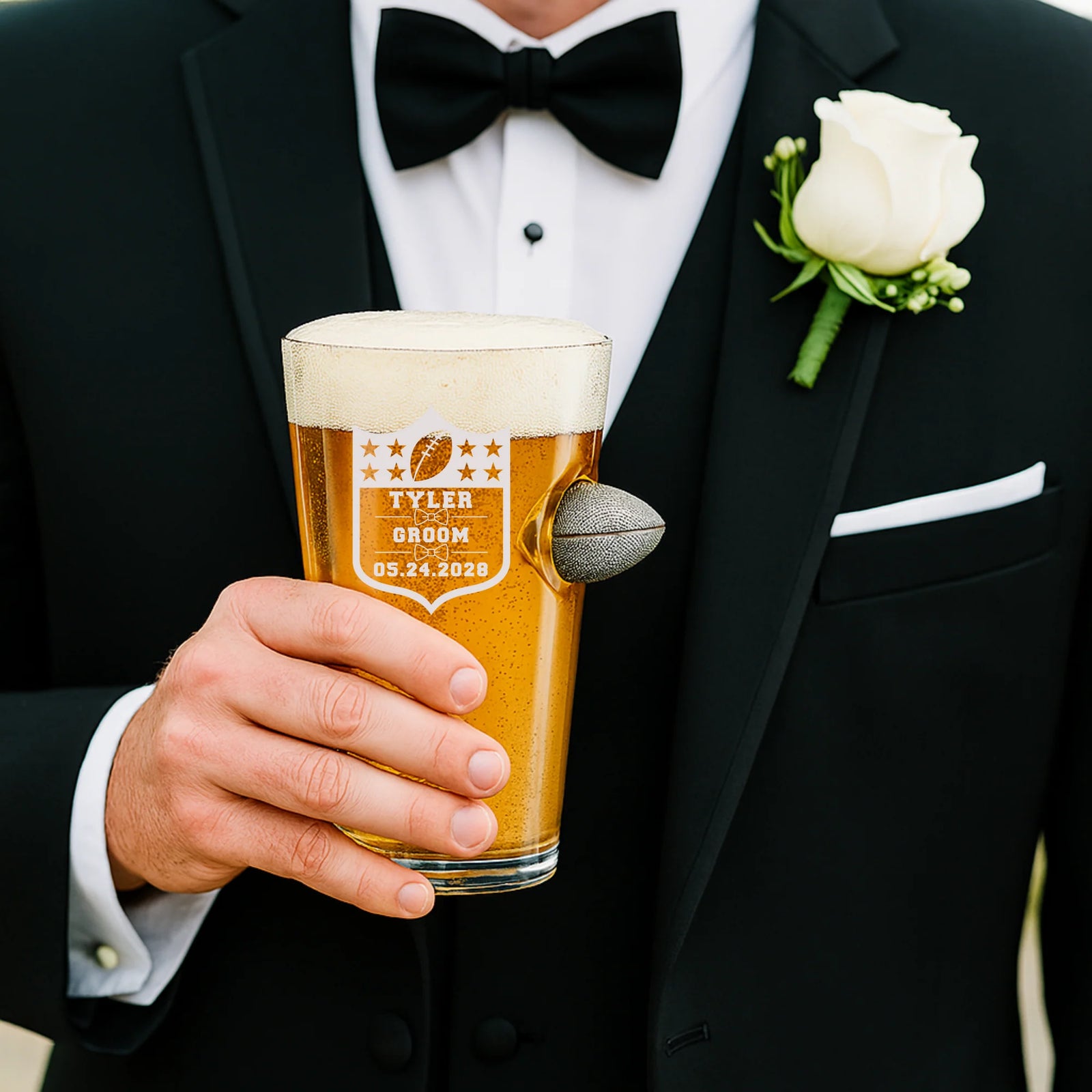 Custom football-themed groomsmen pint glass with engraved name, role, and wedding date