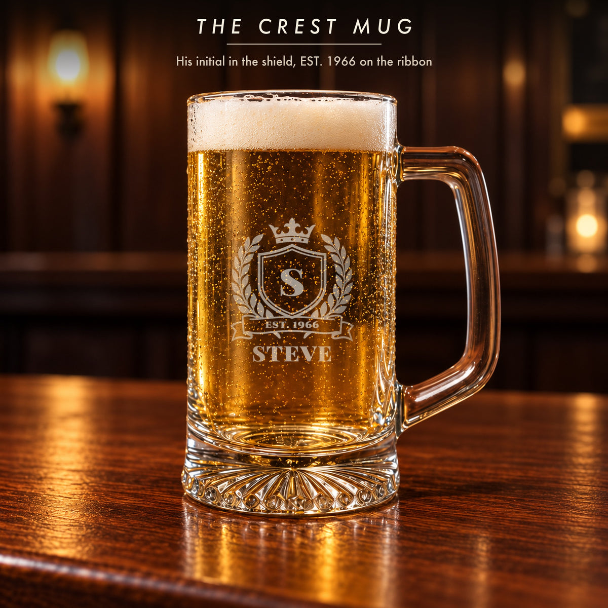 Close-up of the crest beer mug from the 60th birthday gift set: initial S in the shield, EST. 1966 on the ribbon and Steve below