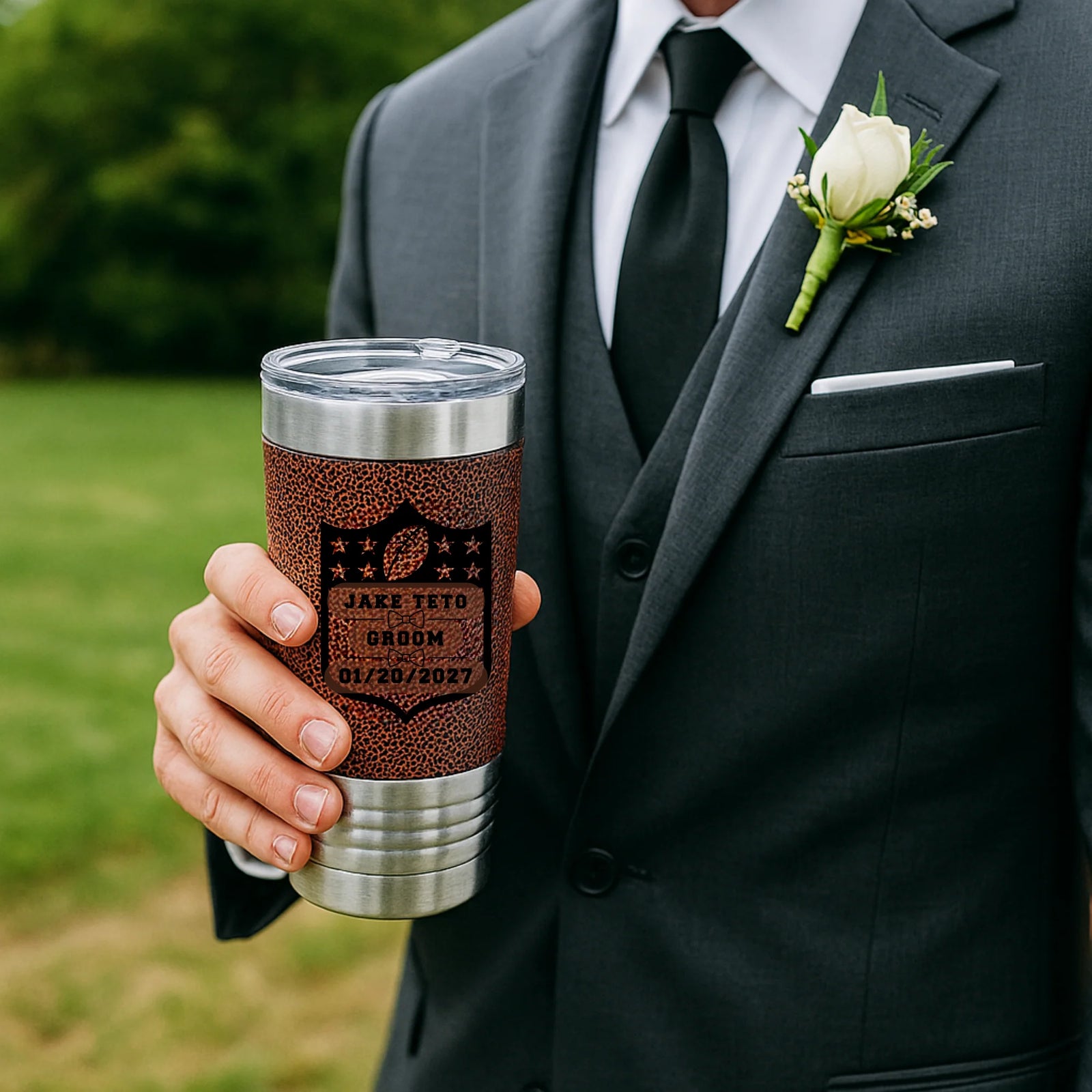 Football-themed stainless steel tumbler with personalized name, role, and wedding date engraving