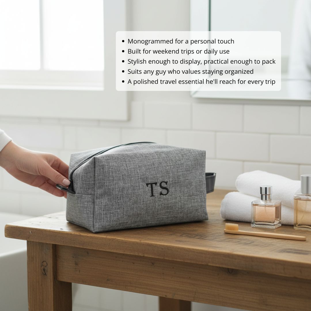 Gray poly-canvas dopp kit with monogrammed sample initials "TS" displayed on wooden vanity with toiletries