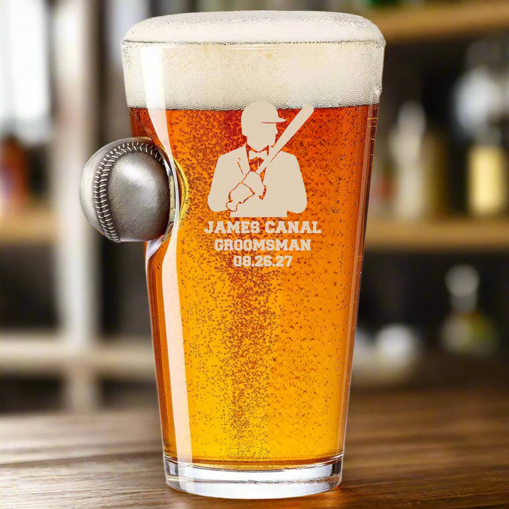 Personalized groomsman pint glass with real embedded baseball and engraved name, role, and wedding date