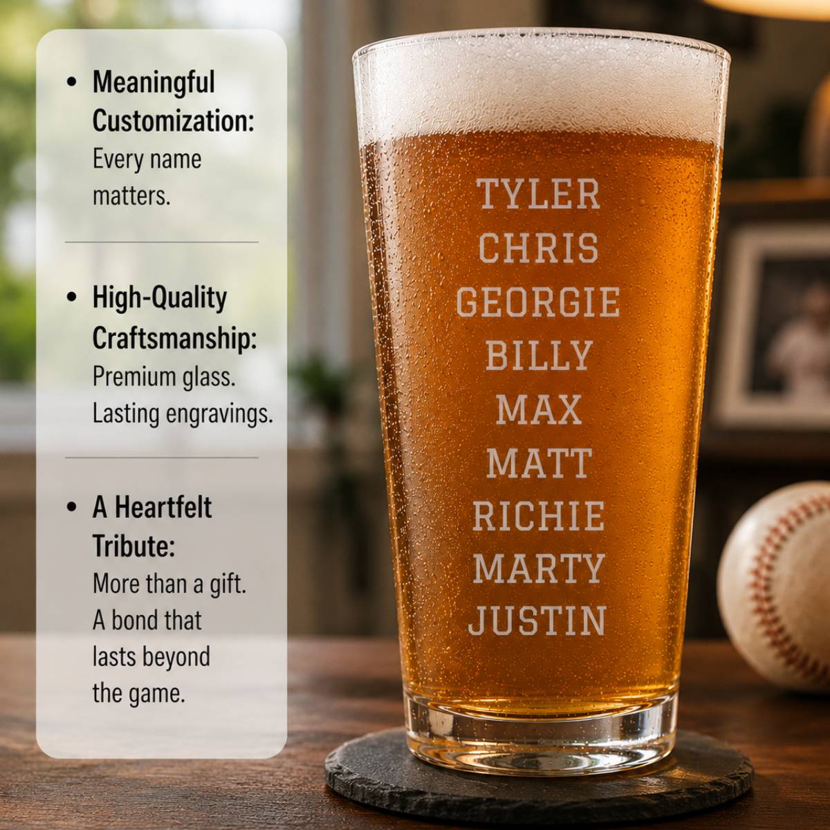 Tall pint glass filled with beer, engraved with sample names Tyler, Chris, Georgie, Billy, Max, Matt, Richie, Marty, and Justin, displayed on dark coaster with baseball visible in background.