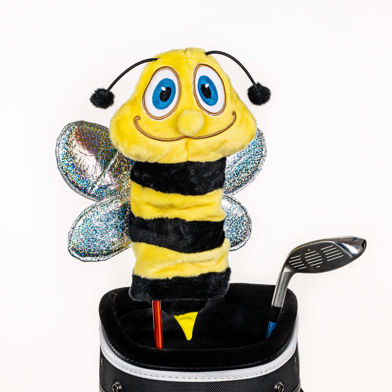 Plush bumble bee golf headcover covering a club in a golf bag, a standout golf gift for men from Groovy Guy Gifts