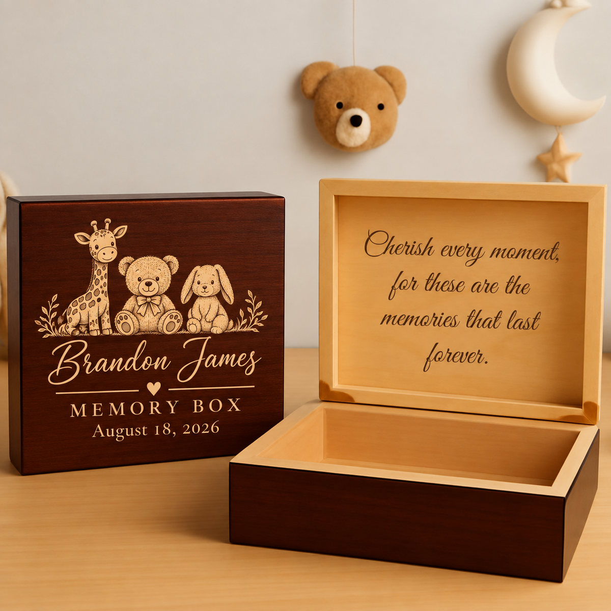 Wooden memory box with engraved cover showing stuffed animals and sample date, open box beside showing interior with engraved text