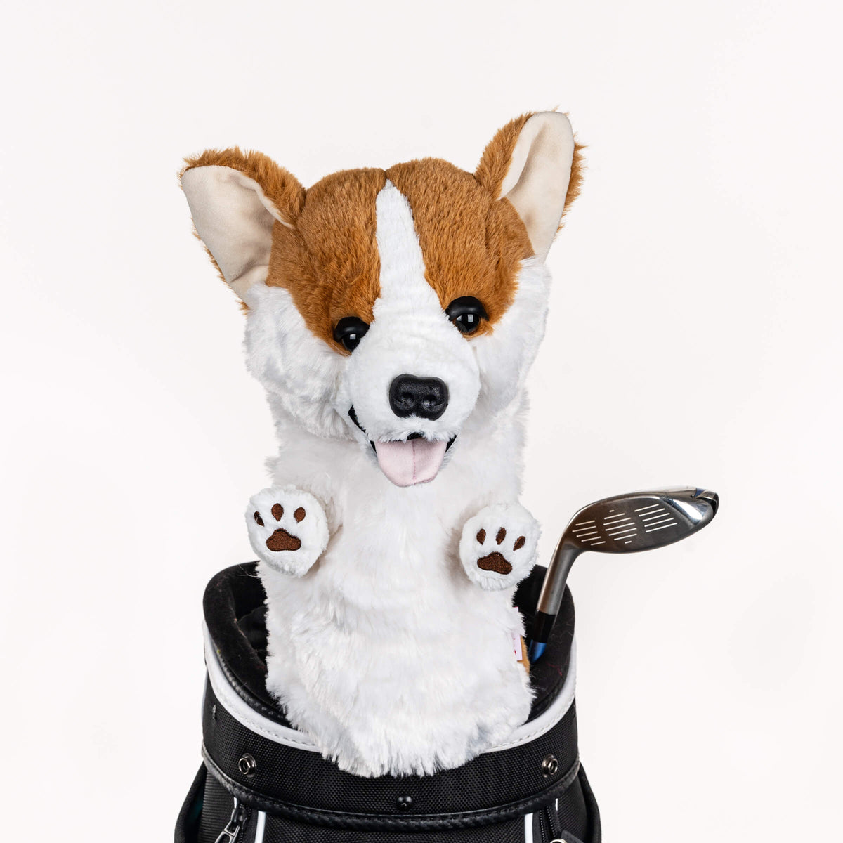 Plush corgi golf headcover covering a club in a golf bag, a standout golf gift for men from Groovy Guy Gifts