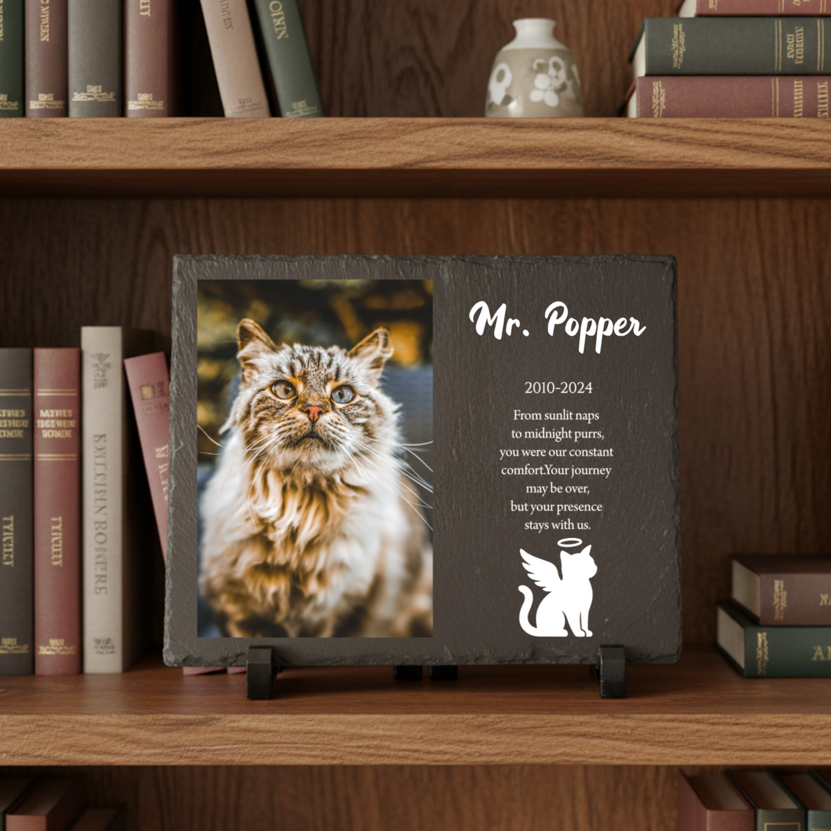 Dark slate memorial plaque customized with cat photo, "Mr. Popper" name, dates 2010-2024, and personalized tribute text with angel silhouette