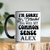Black Funny Coffee Mug With Does Common Sense Offend You Design