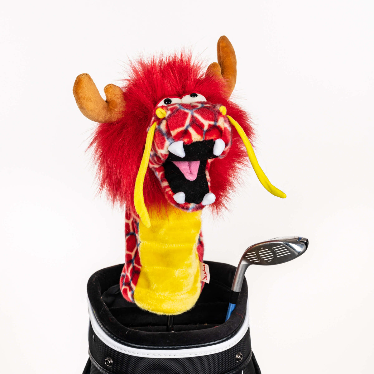 Plush red dragon golf headcover covering a club in a golf bag, a standout golf gift for men from Groovy Guy Gifts