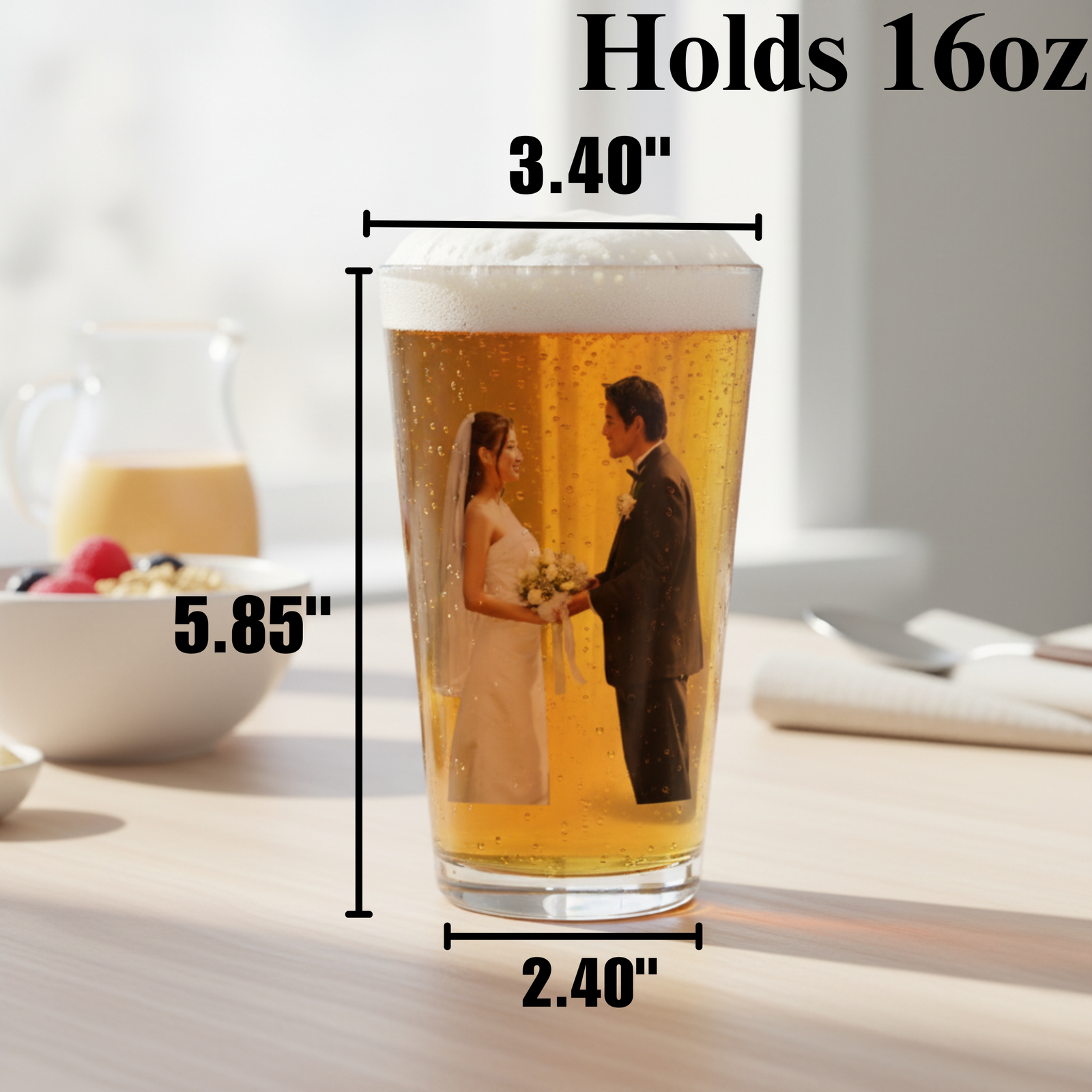 16-ounce pint glass with custom photo print showing couple in wedding attire, dimensions marked as 5.85 inches tall and 3.40 inches wide