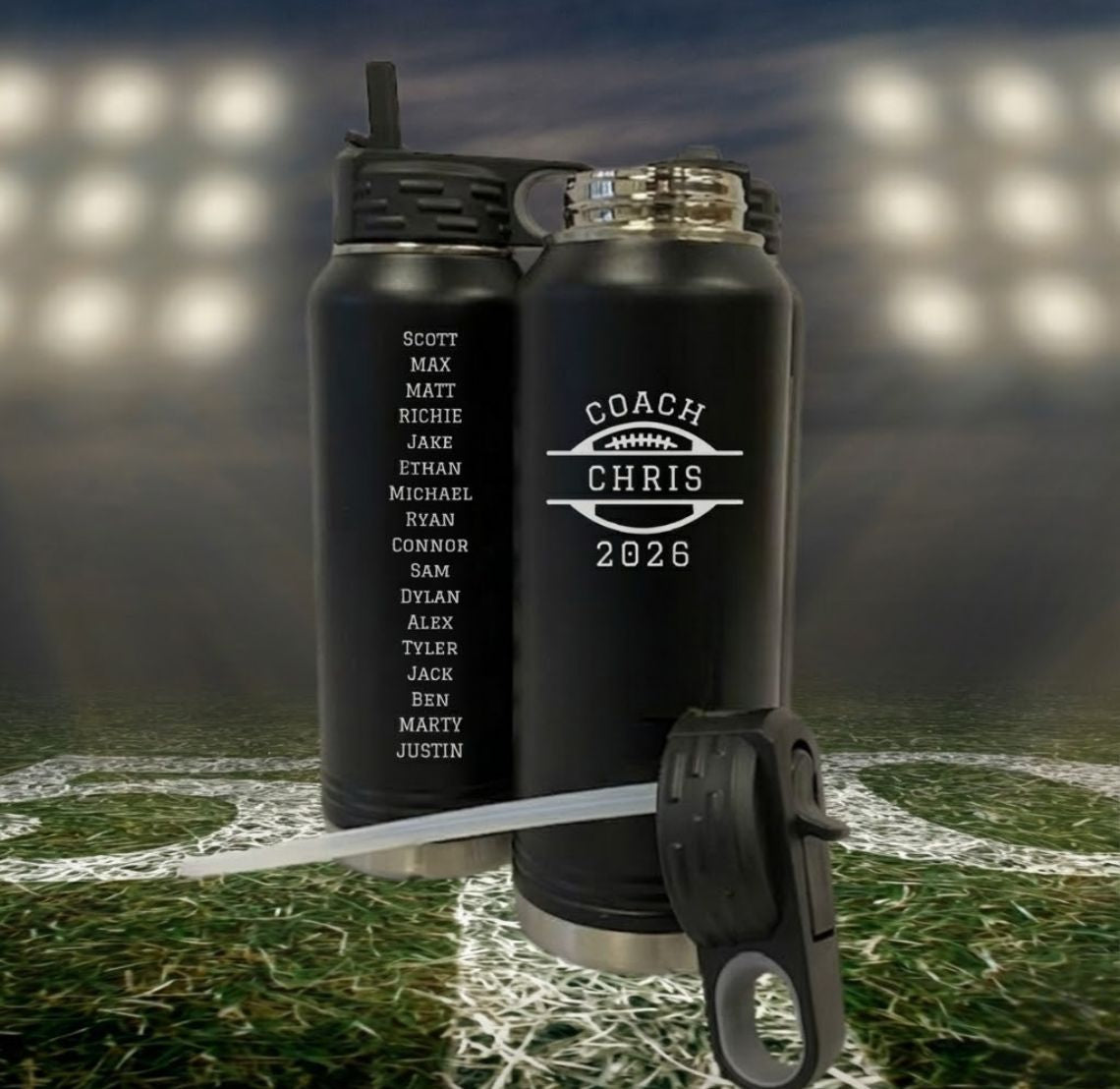 Two black football coach water bottles with personalized engravings on a football field background