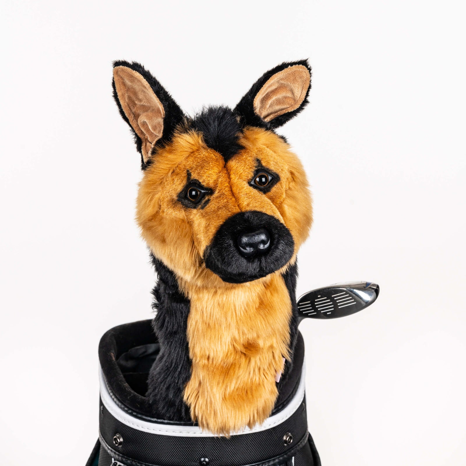 Plush German shepherd golf headcover covering a club in a golf bag, a standout golf gift for men from Groovy Guy Gifts