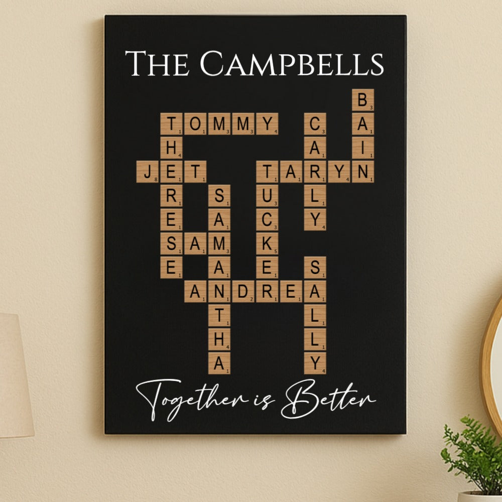 Black wall sign with family names arranged in Scrabble-style crossword layout, reading "The Campbells" at top and "Together is Better" at bottom in script