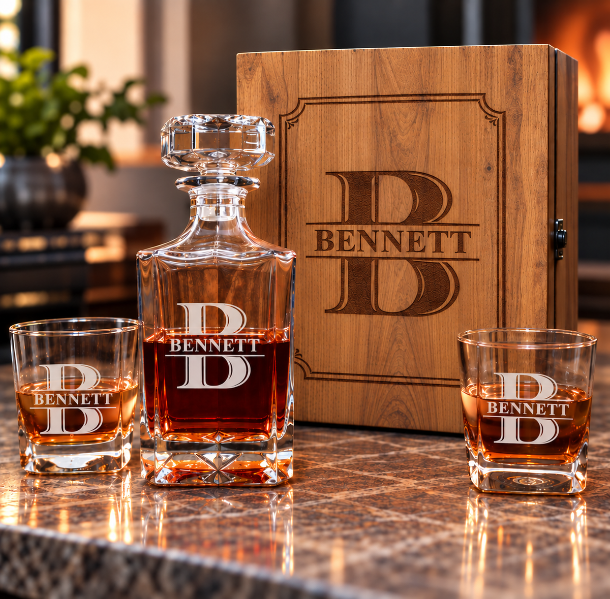 Personalized retirement decanter and two matching glasses in front of a wood gift box, all engraved with a split monogram initial B and the name Bennett