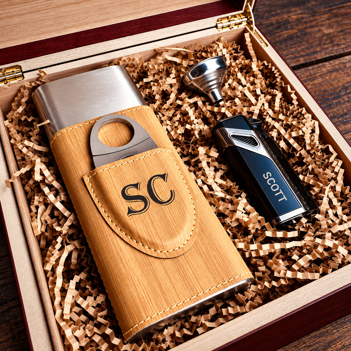 Personalized cigar humidor with wood and stainless steel exterior engraved "SC", paired with cigar cutter and lighter in premium gift box