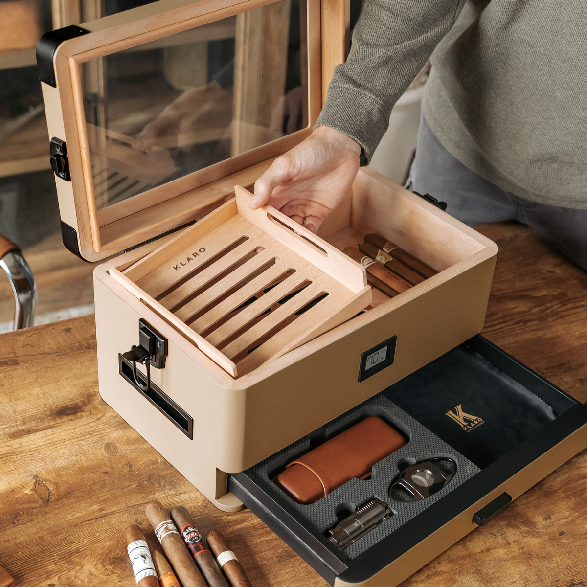 Coyote tan military cigar humidor with Spanish cedar lining, black corner guards, and storage drawer.
