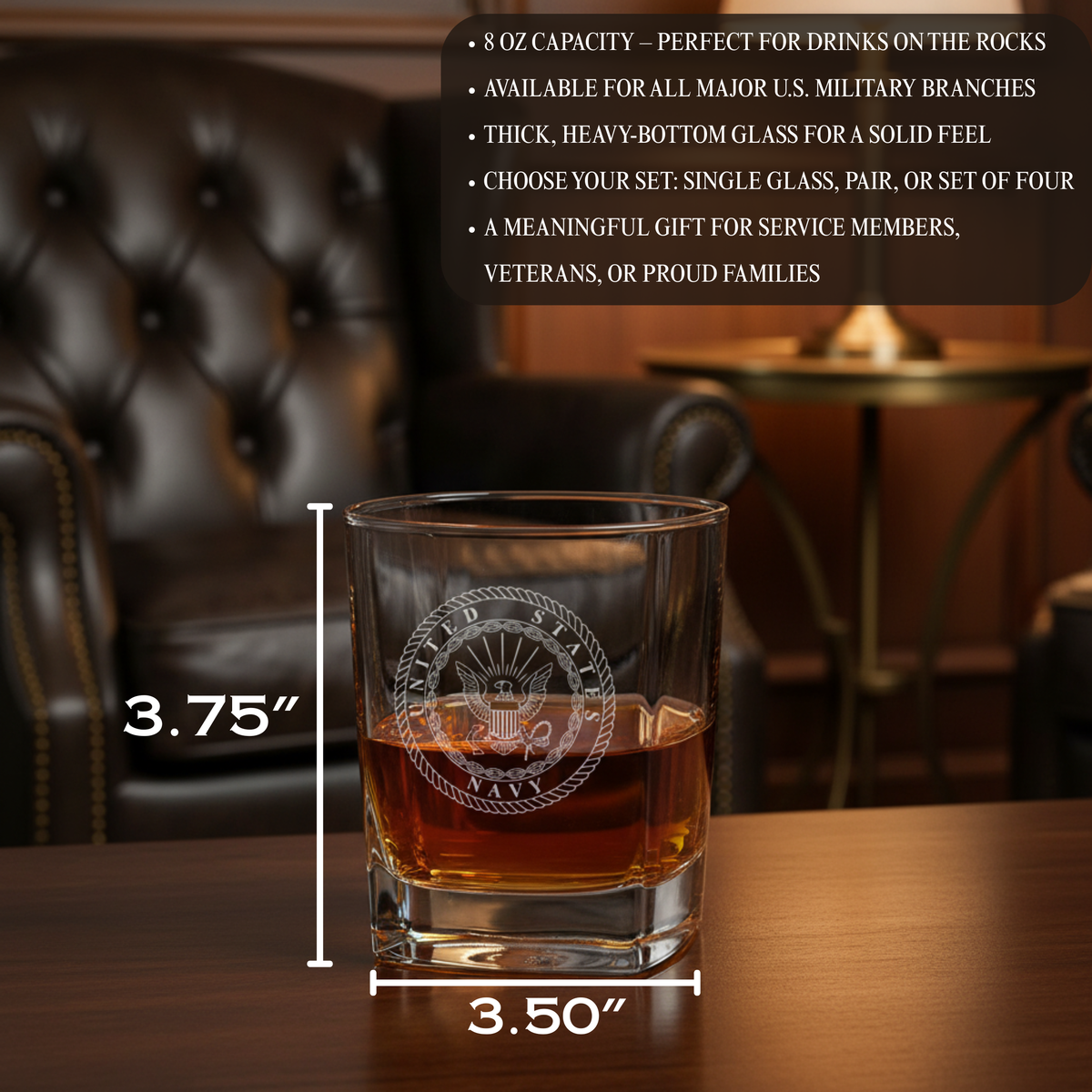 Heavy-bottomed rocks glass with laser-engraved Navy emblem, filled with whiskey, displayed with dimension measurements in formal home bar setting