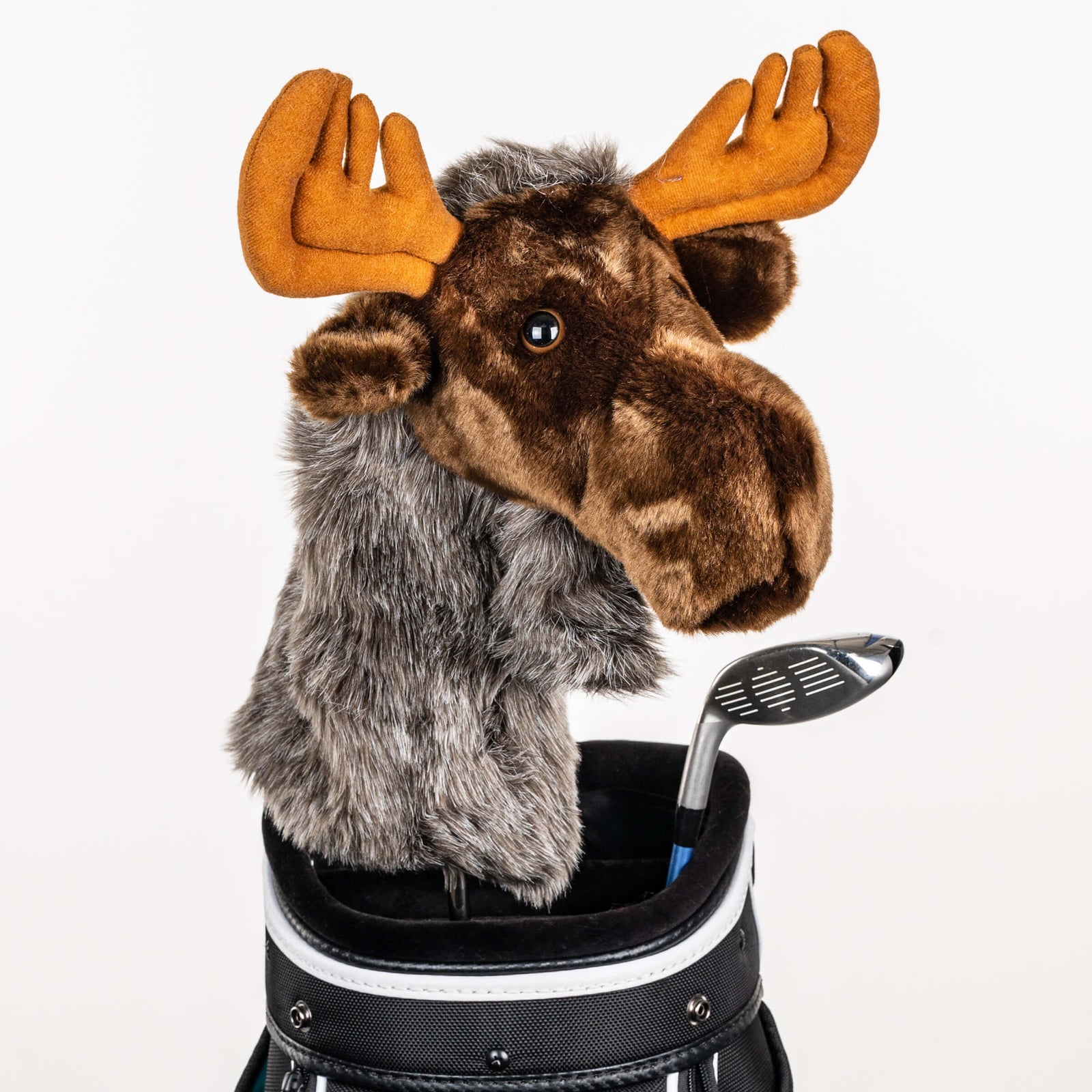 Plush moose golf headcover covering a club in a golf bag, a standout golf gift for men from Groovy Guy Gifts