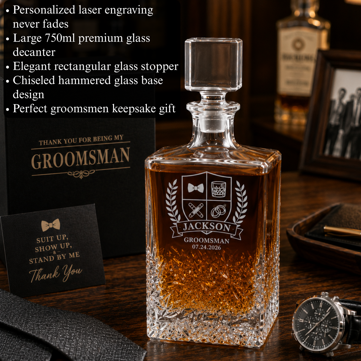 Engraved whiskey decanter with sample name "Jackson" and groomsman shield crest with date, displayed with matching cards and accessories