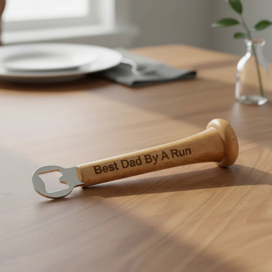 Wooden bottle opener with engraved text on a wooden table