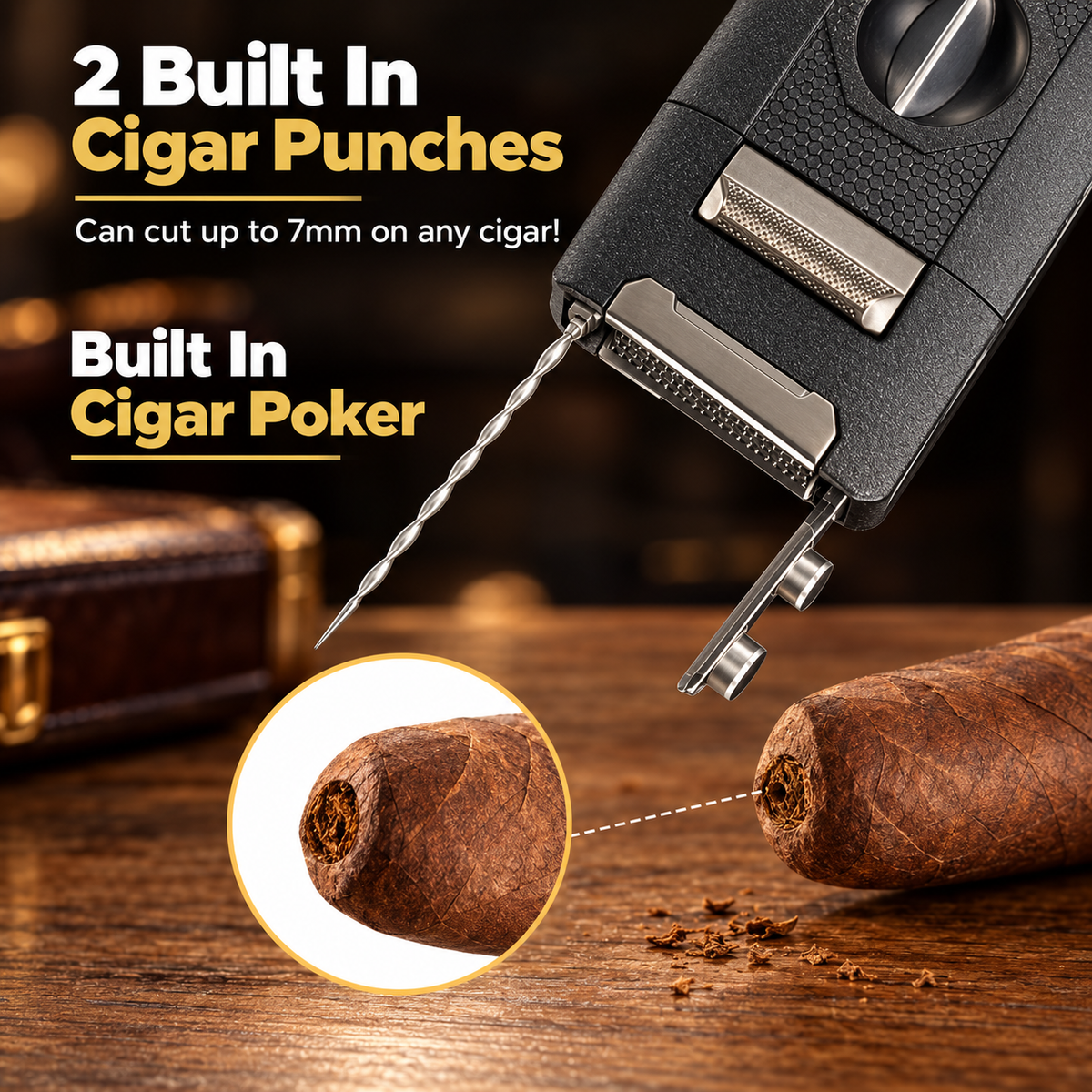 Black metal lighter with built-in cigar punch and cigar poker, positioned above two brown cigars on wooden surface with close-up detail inset