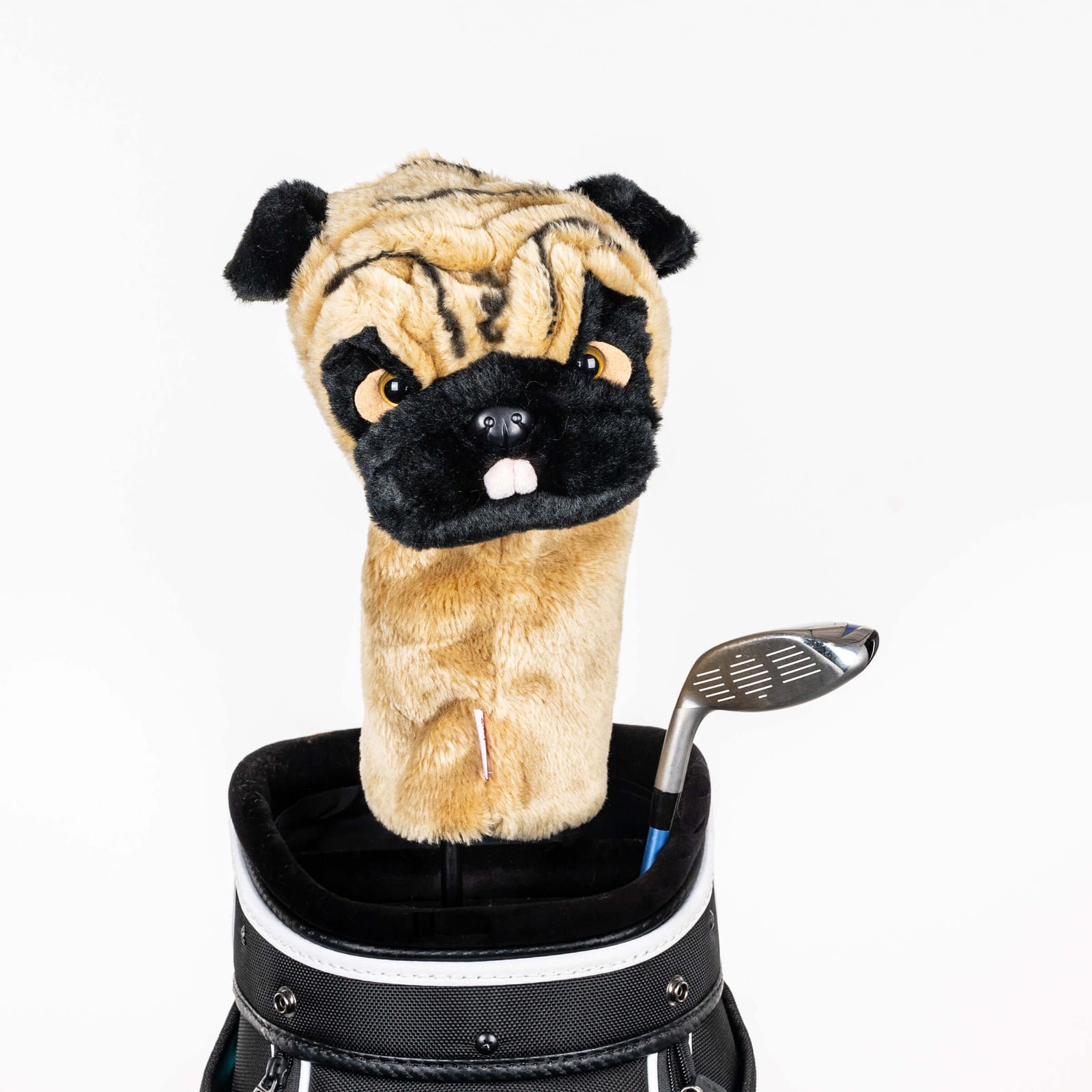 Plush pug golf headcover covering a club in a golf bag, a standout golf gift for men from Groovy Guy Gifts