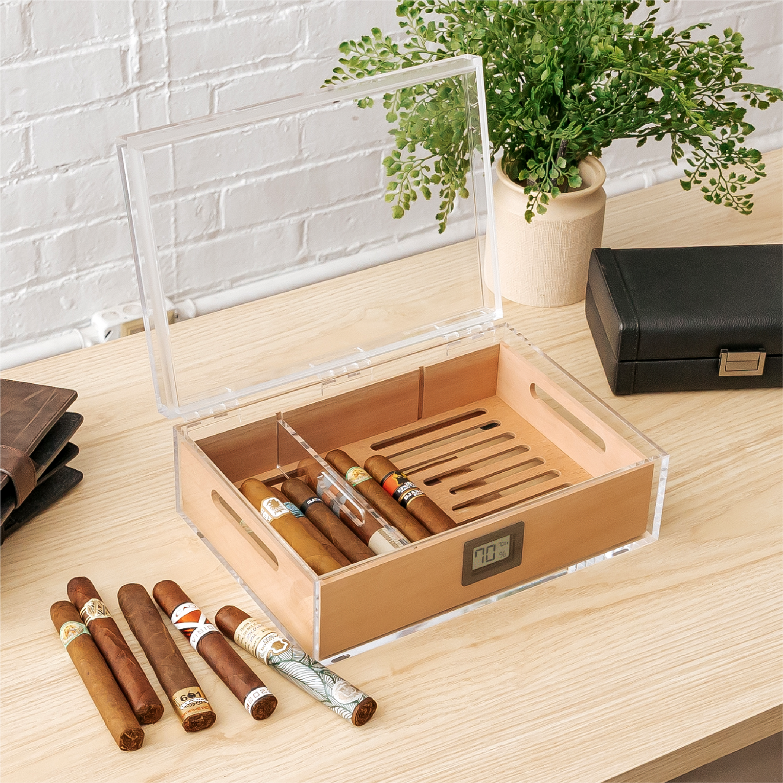Clear acrylic cigar humidor with Spanish cedar tray and digital hygrometer.