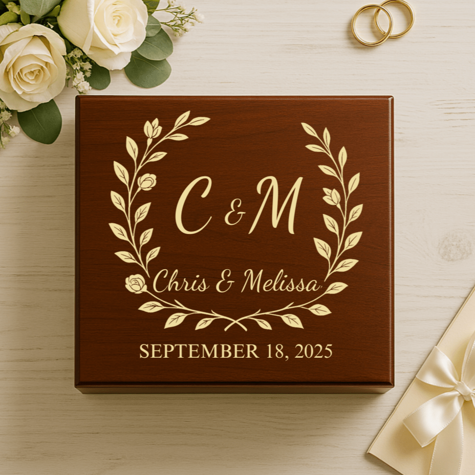 Elegant wedding keepsake box featuring engraved names and date with a romantic floral design, perfect for storing wedding mementos.