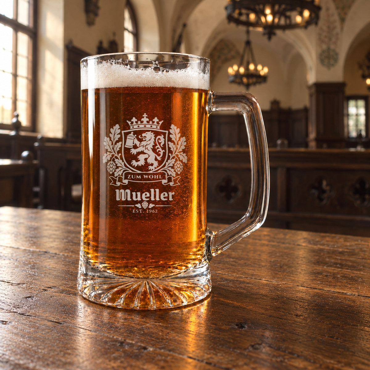 Bavarian crest personalized beer stein on a long wooden table in a German beer hall with chandeliers, engraved Zum Wohl, Mueller and Est. 1962