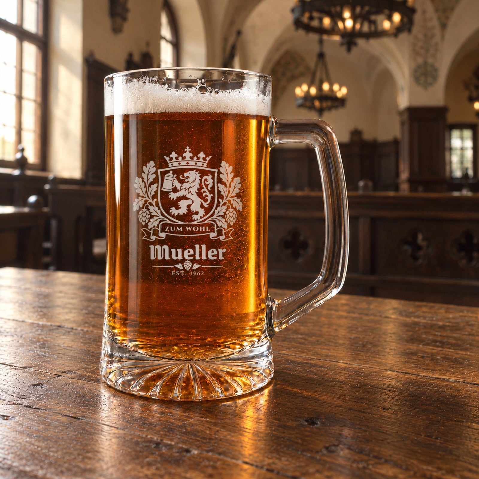 Bavarian crest personalized beer stein on a long wooden table in a German beer hall with chandeliers, engraved Zum Wohl, Mueller and Est. 1962