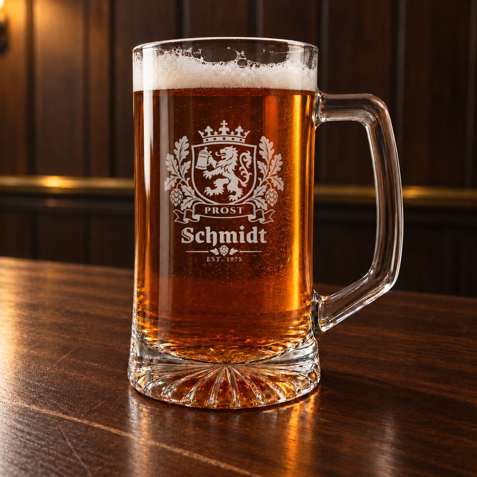 Personalized beer stein on a bar, engraved with a crowned Bavarian crest, a lion holding a stein, oak leaves and hops, Prost, Schmidt and Est. 1975