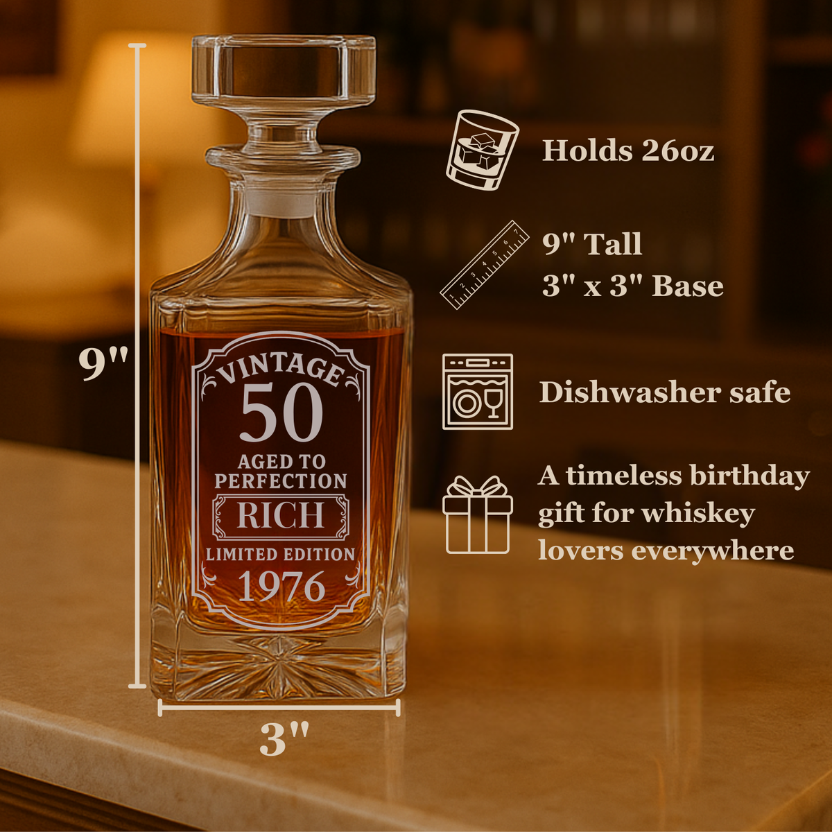 Engraved whiskey decanter with sample "Vintage 50 Aged to Perfection" label, 9 inches tall, 26oz capacity, shown with specification details and warm background lighting.