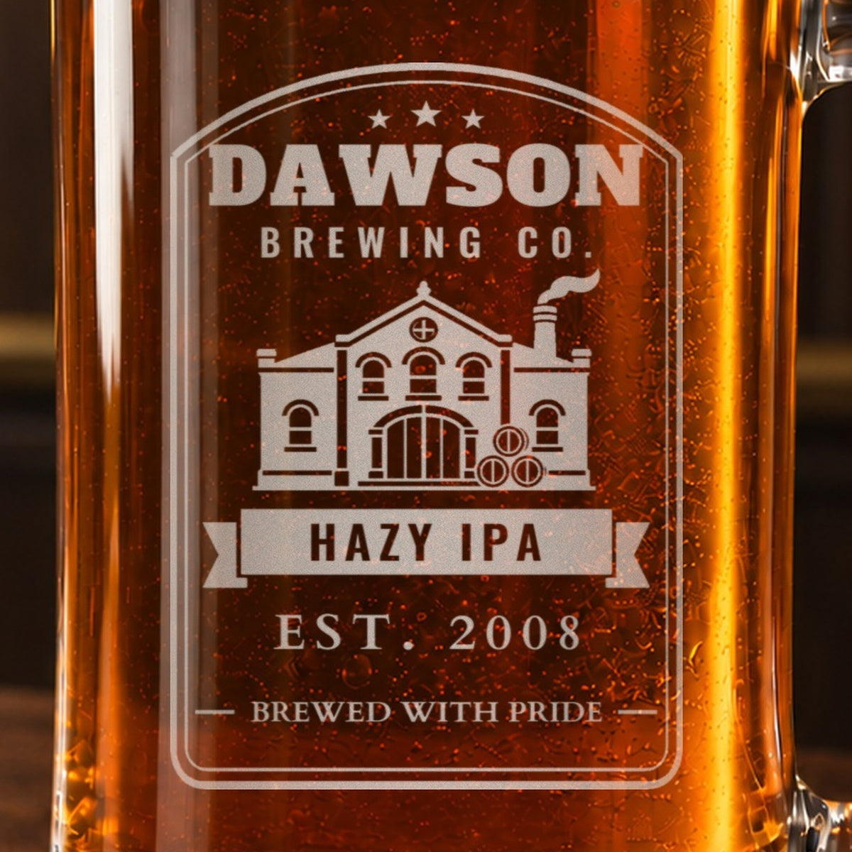Close-up of the frosted vintage brewery label engraving with a brick brewhouse and barrels, reading DAWSON BREWING CO., HAZY IPA and EST. 2008
