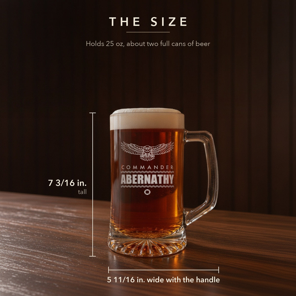 Size guide for the 25 oz engraved Coast Guard retirement stein, 7 3/16 inches tall and 5 11/16 inches wide, engraved Commander Abernathy