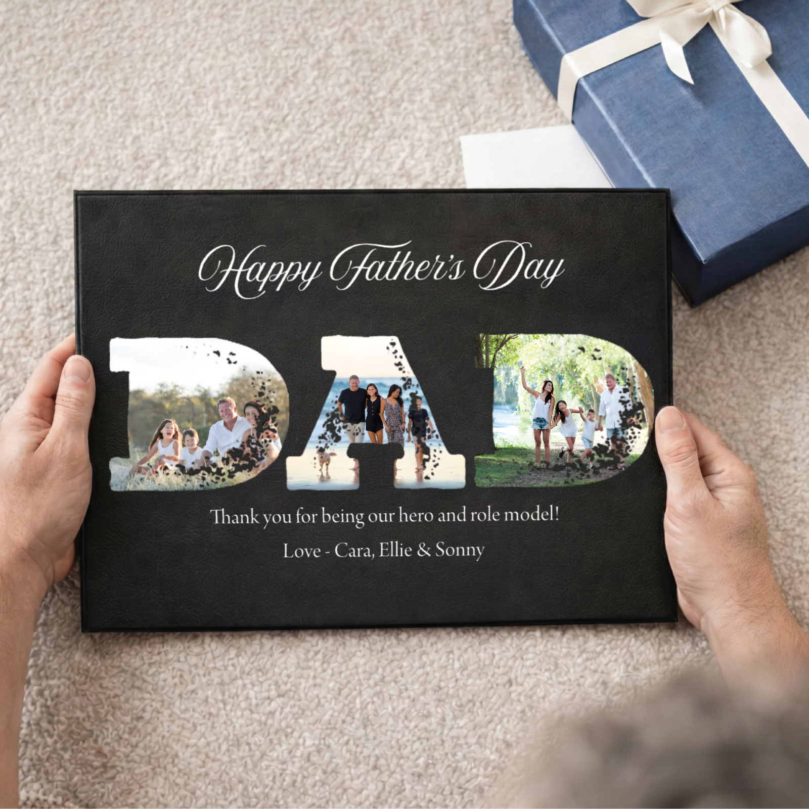 Personalized Father's Day gift with photos of a family and a blue gift box on a beige surface.