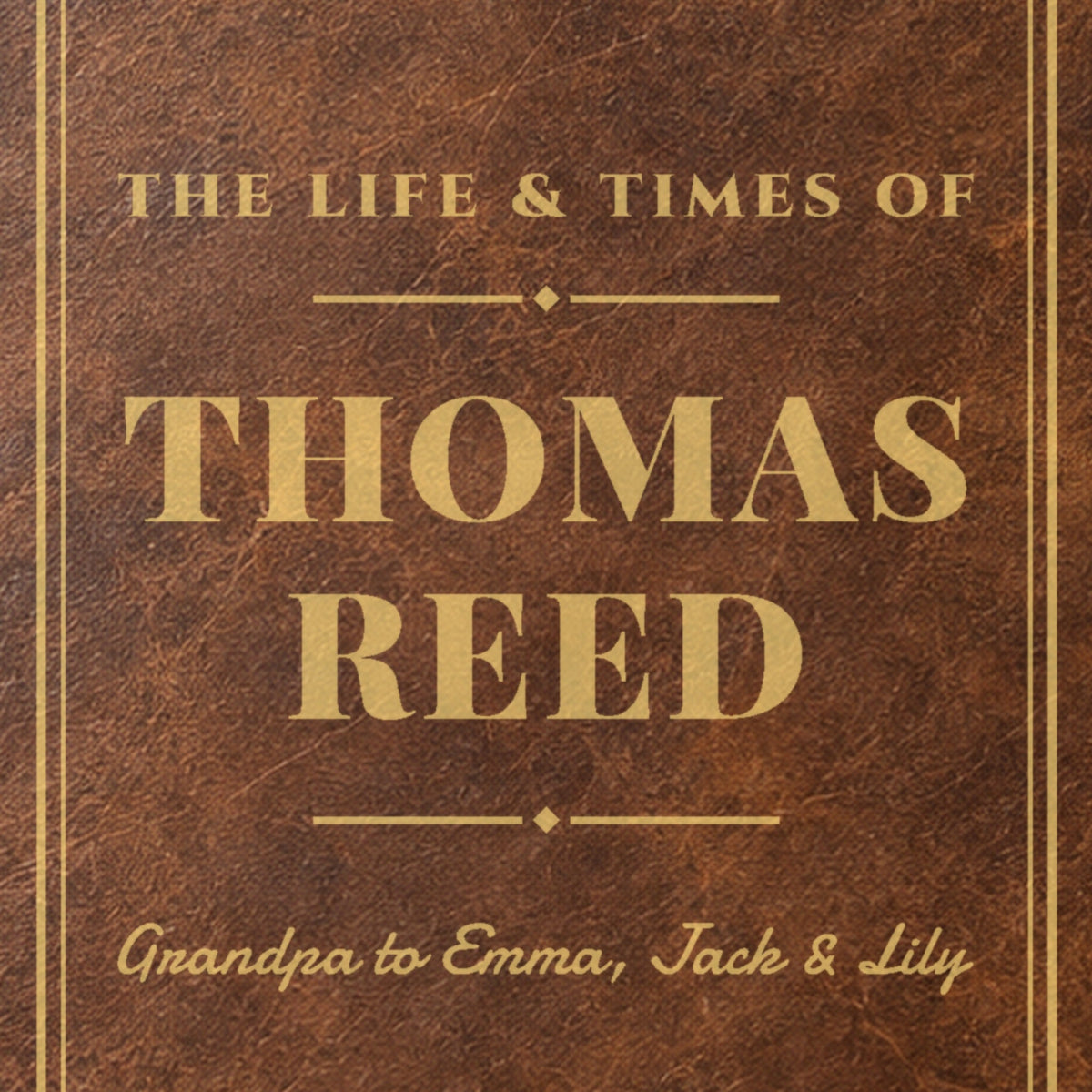 Close-up of the gold laser engraving on the rustic brown grandpa journal: The Life & Times of Thomas Reed, Grandpa to Emma, Jack & Lily