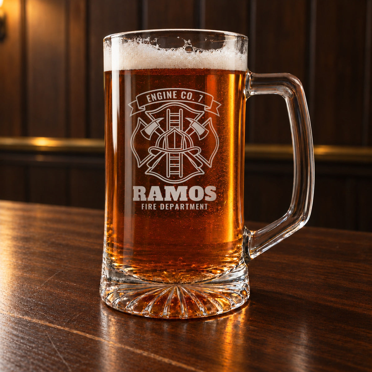 Personalized firefighter beer stein on a bar, engraved with a Maltese cross, helmet, axes and ladder, Engine Co. 7, Ramos and Fire Department