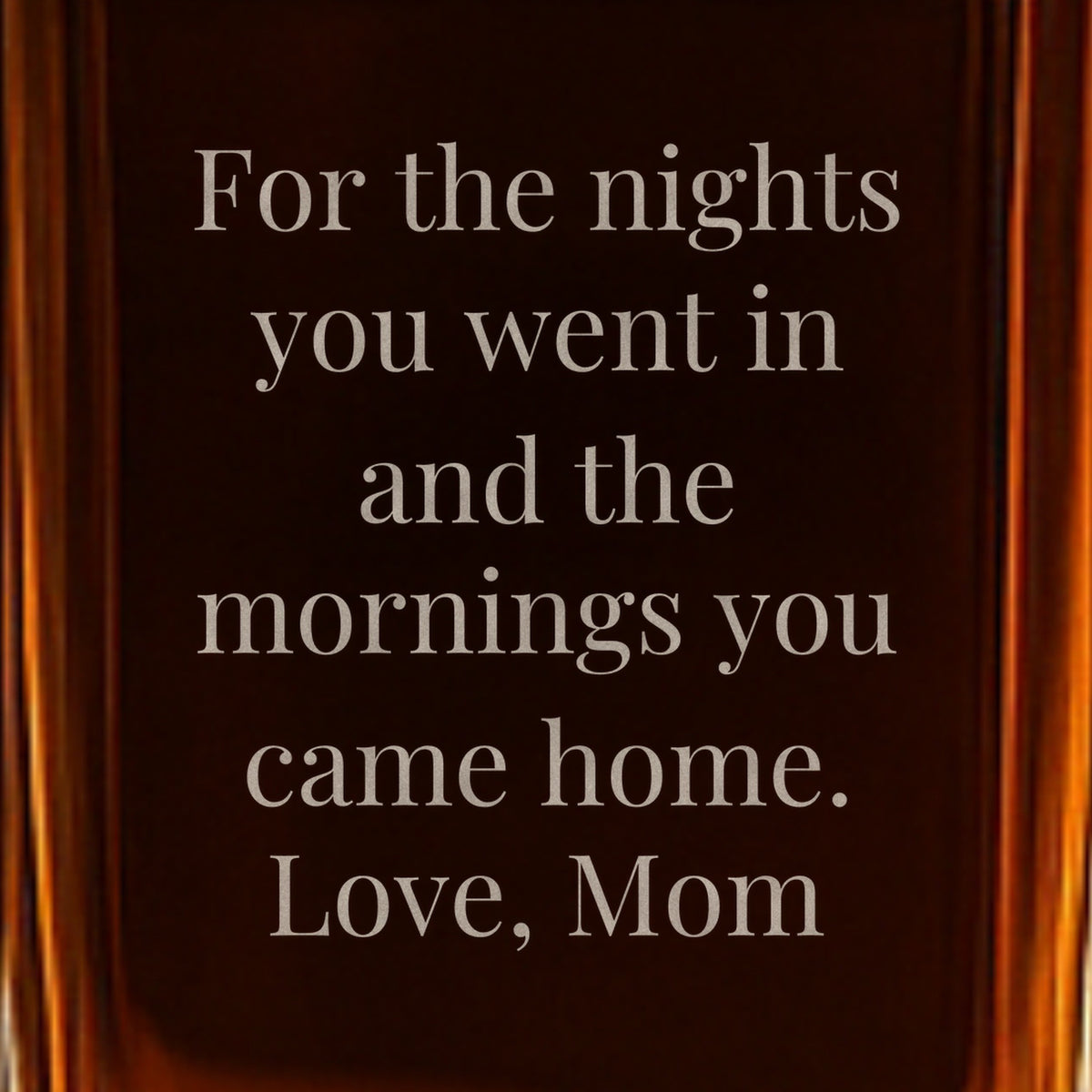 Close-up of a back message engraved on the firefighter decanter: For the nights you went in and the mornings you came home. Love, Mom