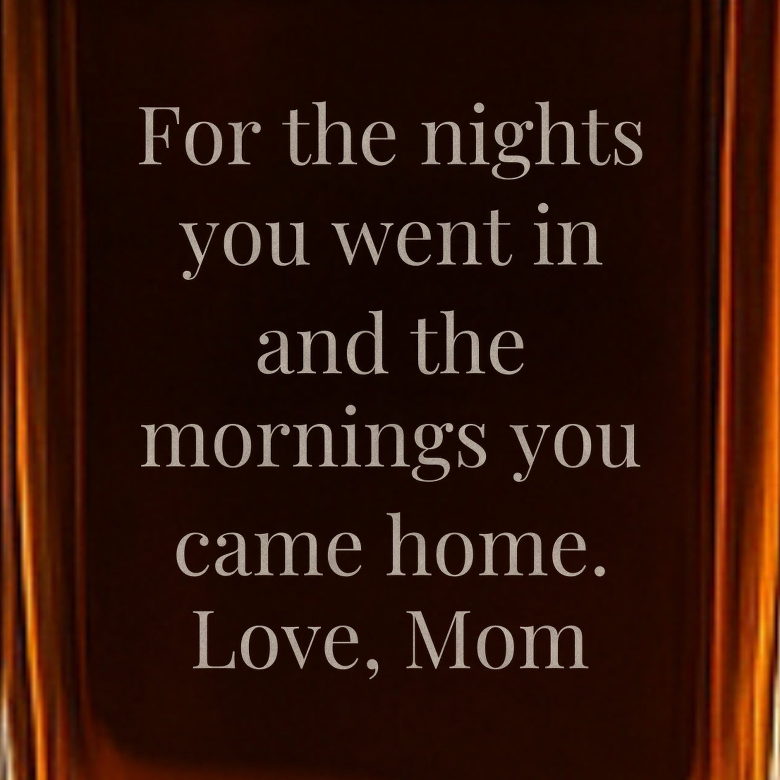 Close-up of a back message engraved on the firefighter decanter: For the nights you went in and the mornings you came home. Love, Mom