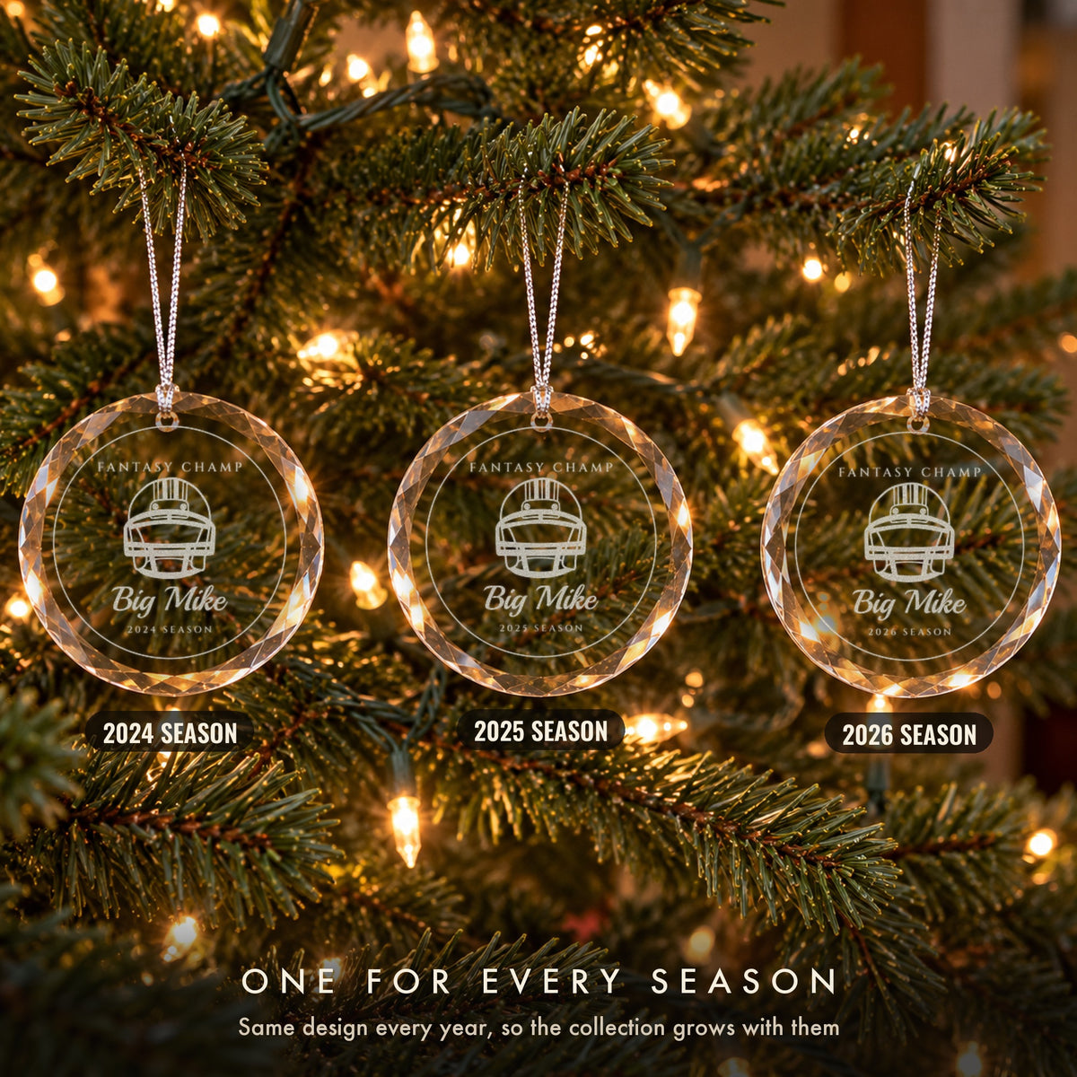 Three personalized football Christmas ornaments in a row on a tree, engraved FANTASY CHAMP, Big Mike for the 2024, 2025 and 2026 seasons, a new one every year