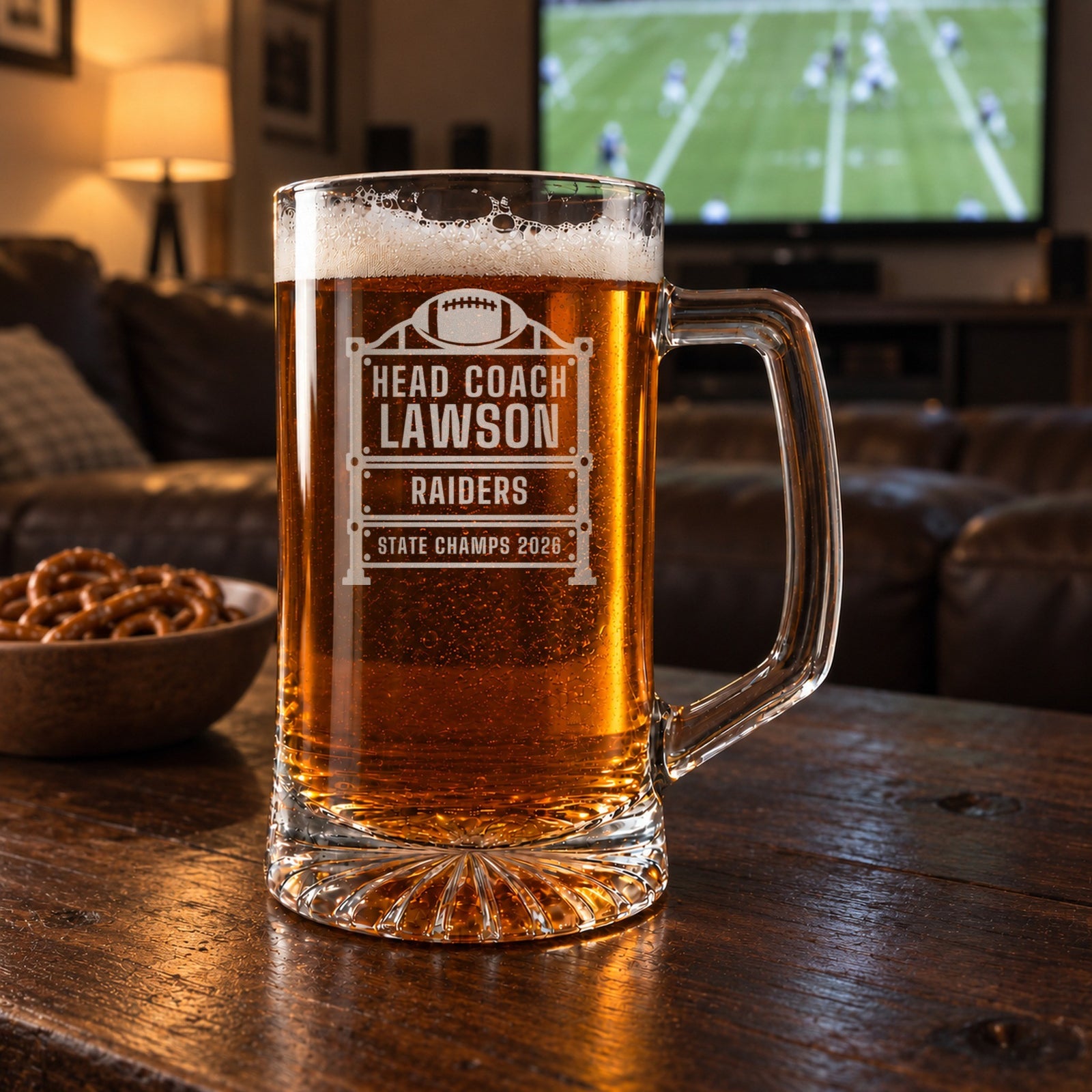 Personalized football coach scoreboard beer stein in a real setting, engraved with a vintage stadium scoreboard with a football on top: Head Coach, Lawson, Raiders