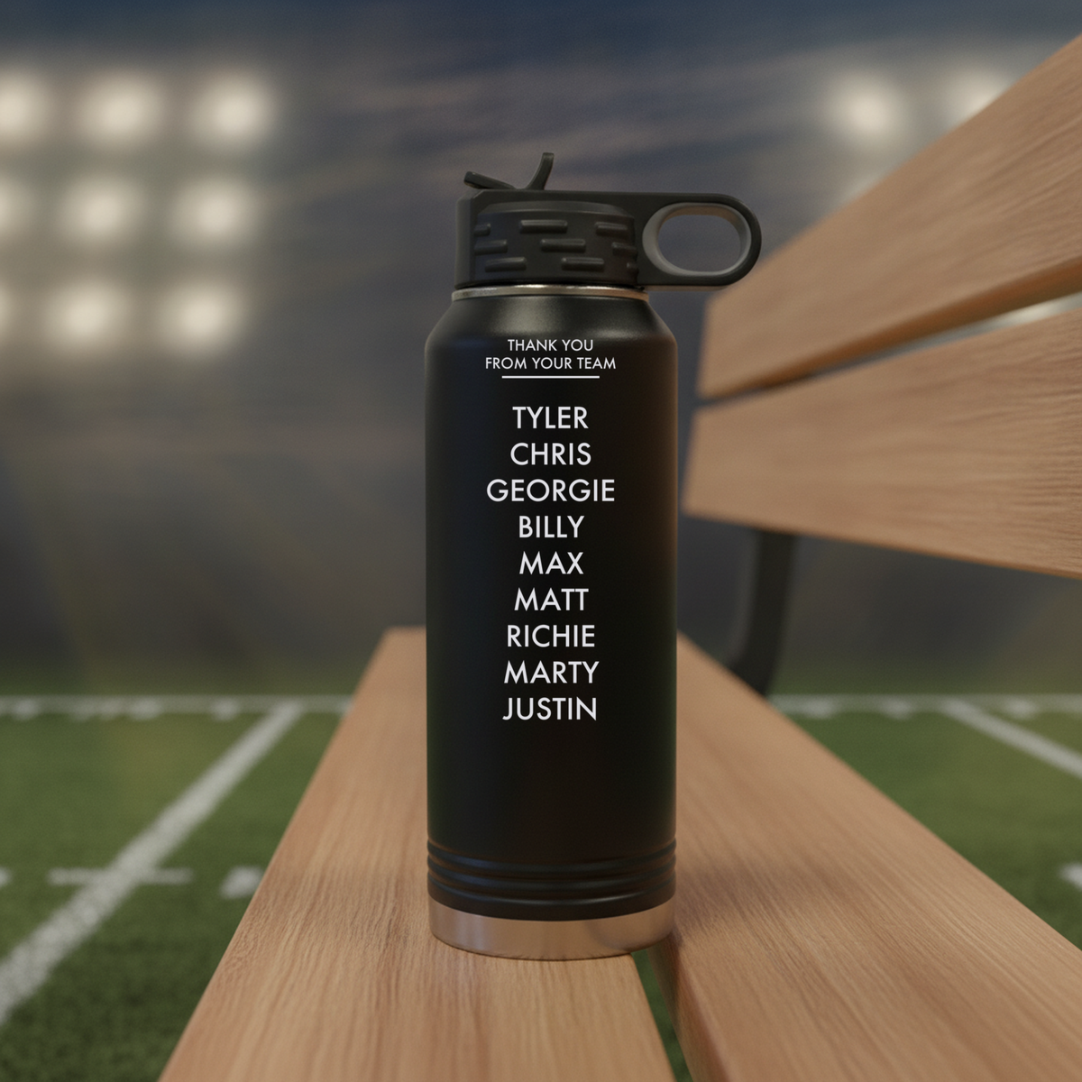 Back of a black 32oz football coach water bottle engraved with Thank You From Your Team above nine player names in silver lettering