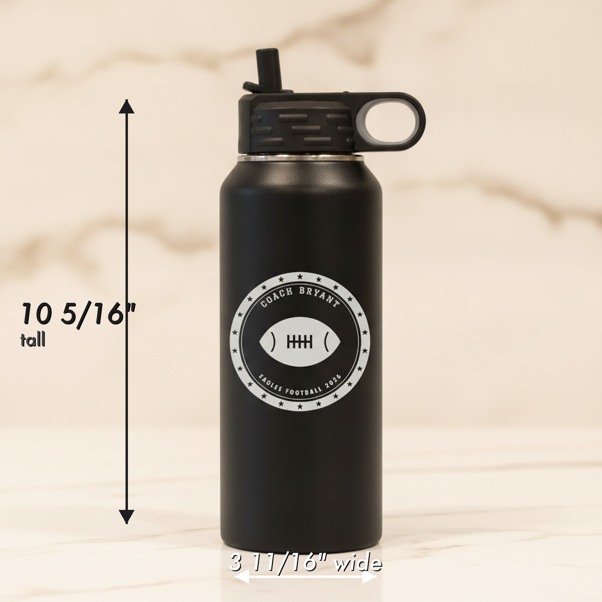 Size diagram of the personalized football coach water bottle measuring 10 5/16 inches tall and 3 11/16 inches wide with flip top lid