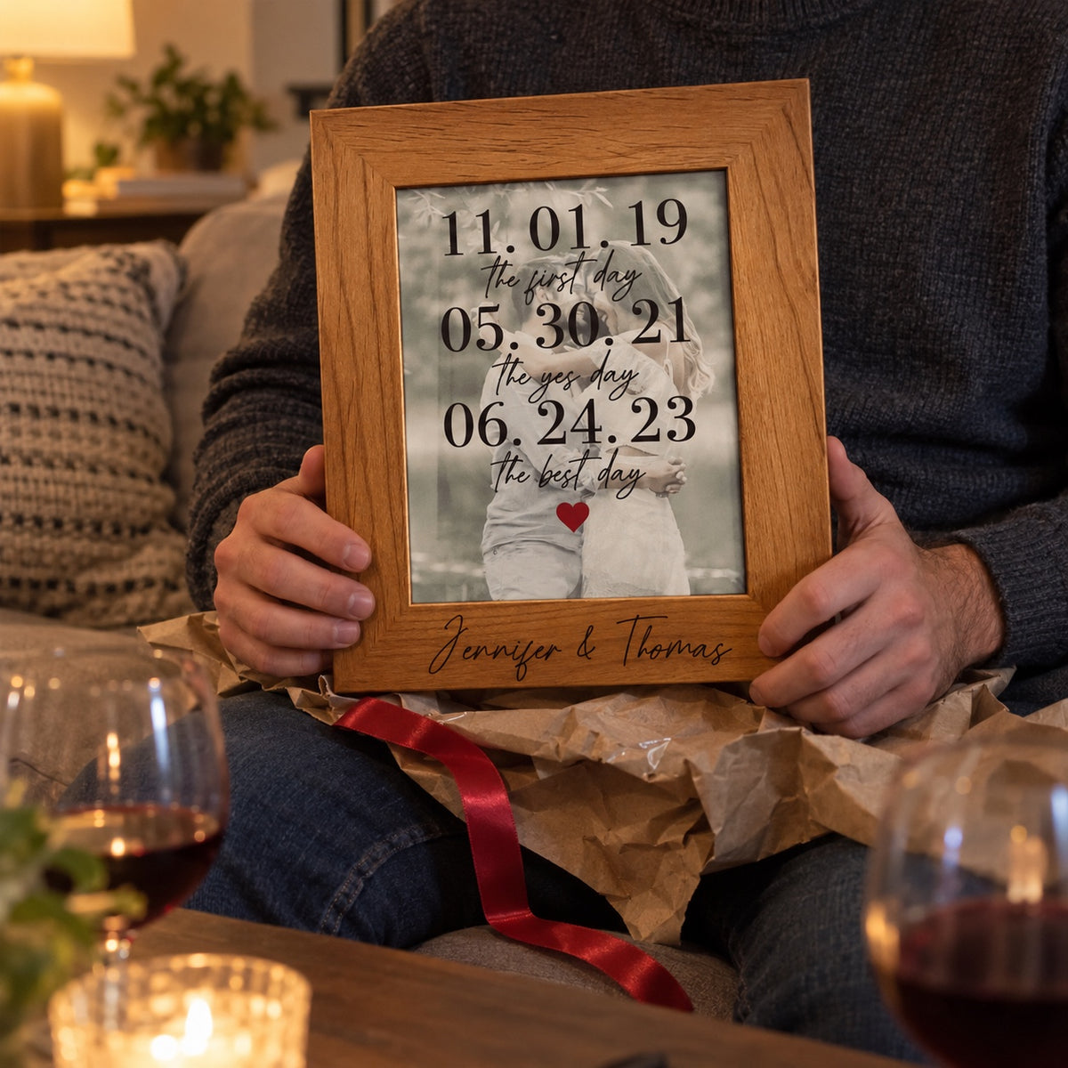 A man holds his personalized Forever Frame just unwrapped on an anniversary evening, a thoughtful anniversary gift for him or your boyfriend