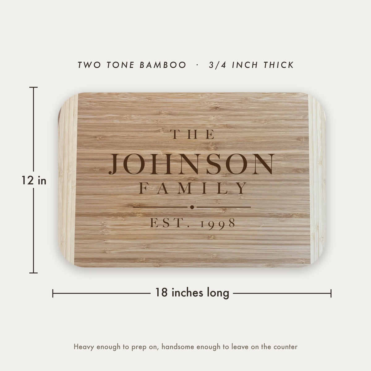 Dimension diagram of the personalized family name cutting board showing 18 inches long by 12 inches wide, in two tone bamboo at three quarters of an inch thick.