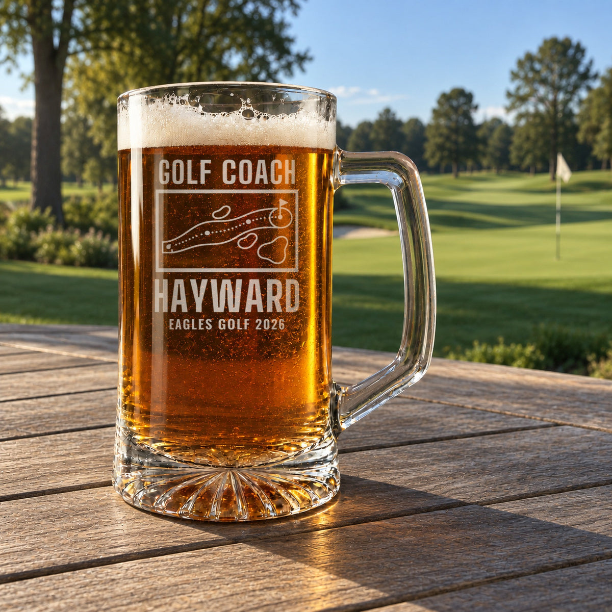 Personalized golf coach yardage book beer stein in a real setting, engraved with a golf hole map with tee, fairway, bunkers, water and green: Golf Coach, Hayward, Eagles Golf 2026