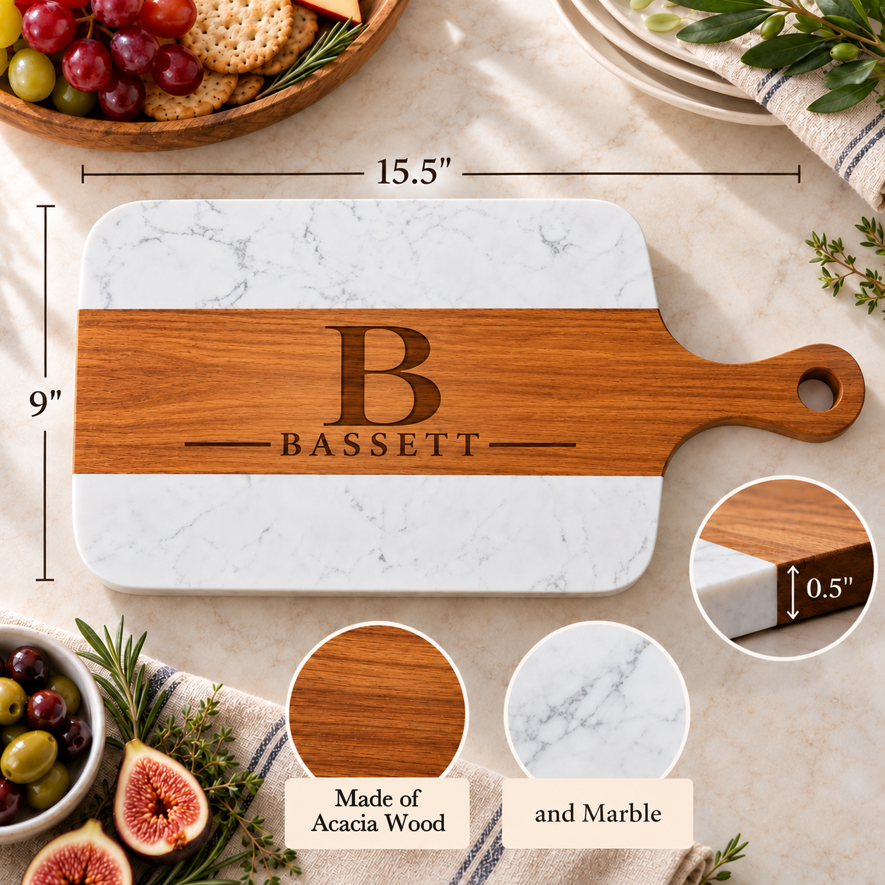 Dimensions of the Heritage Monogram Serving Board, 15.5 by 9 by 0.5 inches, made of acacia wood and marble, shown engraved with initial B and last name BASSETT