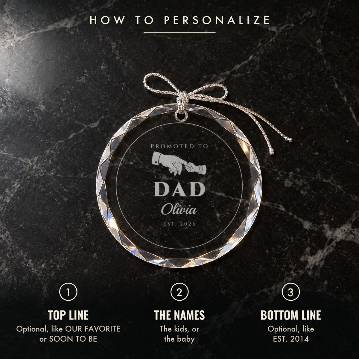 How to personalize the dad ornament: 1 optional top line, 2 the names, 3 optional bottom line, shown on black marble engraved PROMOTED TO DAD